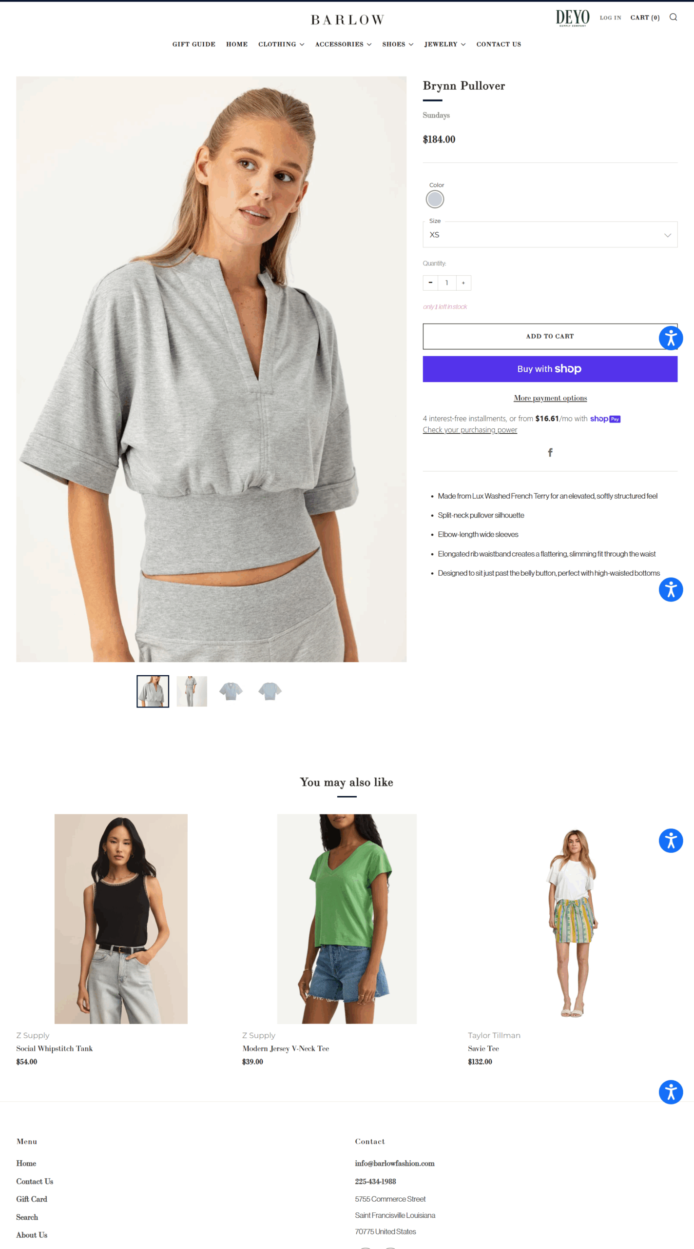 Woman wearing the grey Brynn Pullover with split-neck design